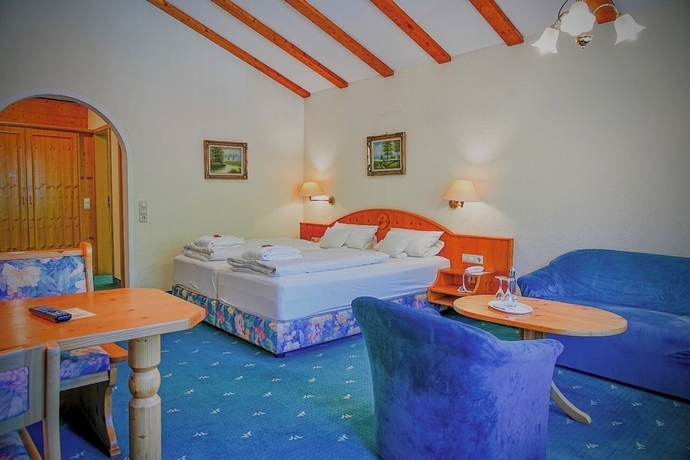 Imagen de la habitación del Holzschuh Schwarzwaldhotel. Foto 4