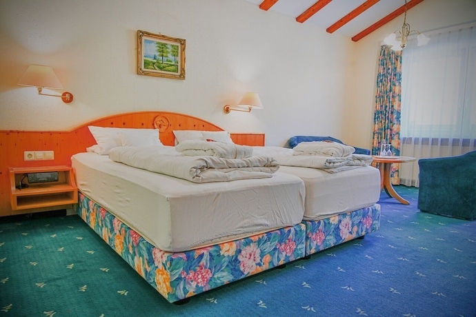 Imagen de la habitación del Holzschuh Schwarzwaldhotel. Foto 5