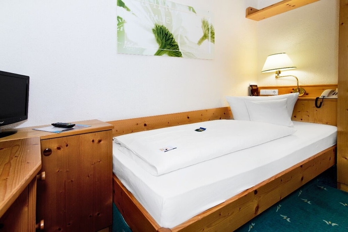 Imagen de la habitación del Holzschuh Schwarzwaldhotel. Foto 12