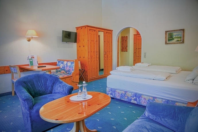 Imagen de la habitación del Holzschuh Schwarzwaldhotel. Foto 13