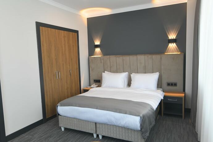 Imagen de la habitación del Home Plus. Foto 13