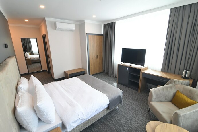 Imagen de la habitación del Home Plus. Foto 17