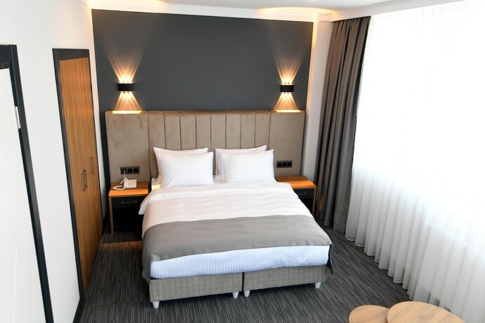 Imagen de la habitación del Home Plus. Foto 18