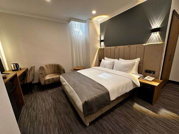 Imagen de la habitación del Home Plus. Foto 19