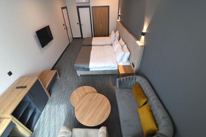 Imagen de la habitación del Home Plus. Foto 22