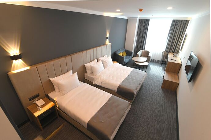 Imagen de la habitación del Home Plus. Foto 23