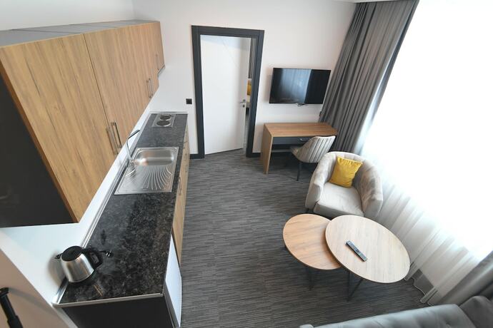 Imagen de la habitación del Home Plus. Foto 26