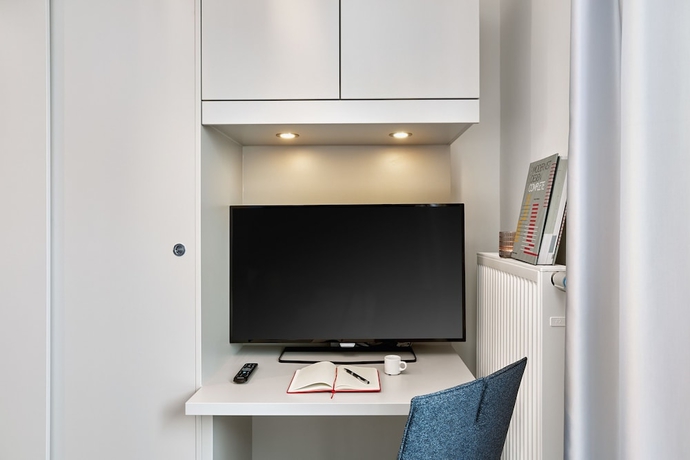 Imagen de la habitación del H.ome Serviced Apartments München. Foto 8