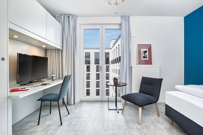 Imagen de la habitación del H.ome Serviced Apartments München. Foto 10