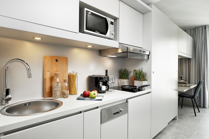 Imagen de la habitación del H.ome Serviced Apartments München. Foto 16