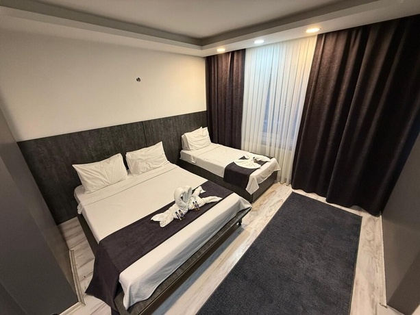 Imagen de la habitación del Home Suit apart otel. Foto 2