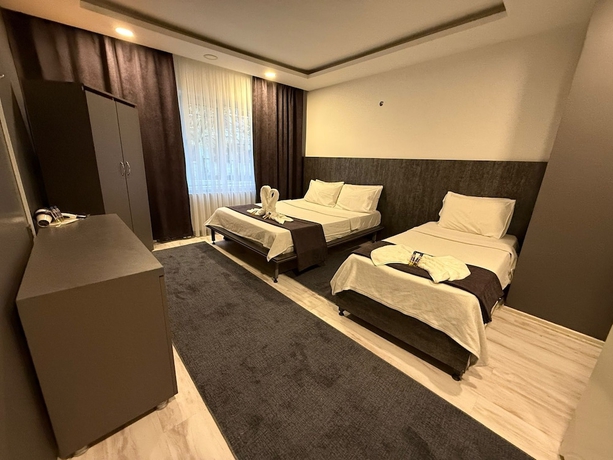 Imagen de la habitación del Home Suit apart otel. Foto 3
