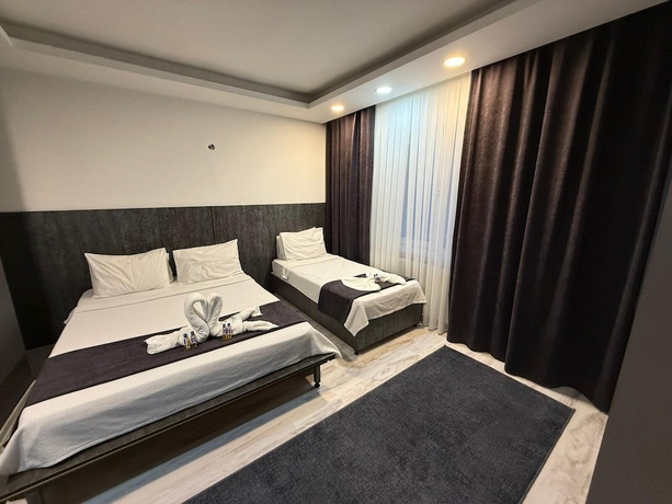 Imagen de la habitación del Home Suit apart otel. Foto 6
