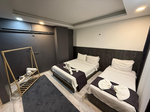 Imagen de la habitación del Home Suit apart otel. Foto 8