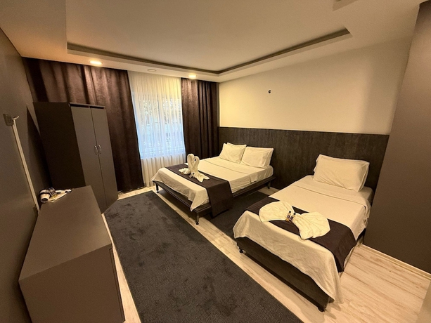 Imagen de la habitación del Home Suit apart otel. Foto 10