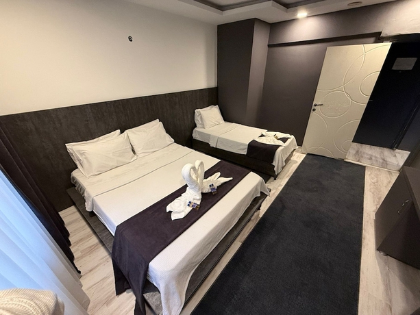 Imagen de la habitación del Home Suit apart otel. Foto 12