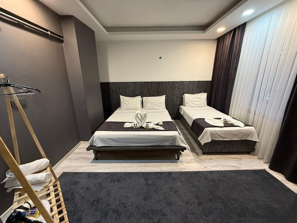 Imagen de la habitación del Home Suit apart otel. Foto 13