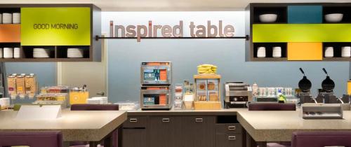 Imagen del bar/restaurante del Home2 Suites By Hilton Covington. Foto 6