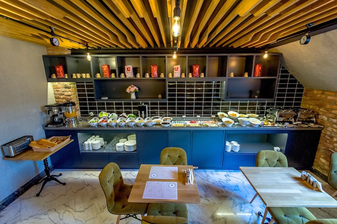 Imagen del bar/restaurante del Homelike Hotel. Foto 2
