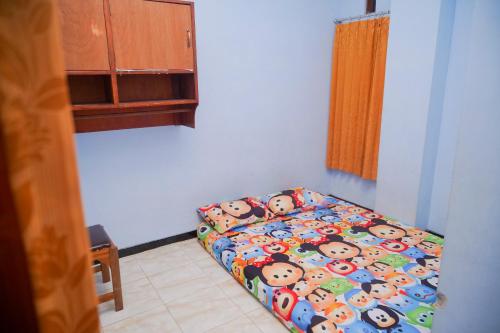 Imagen de la habitación del Homestay Kampung Inggris. Foto 18