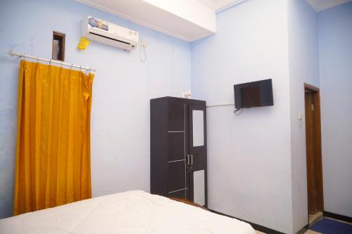 Imagen de la habitación del Homestay Kampung Inggris. Foto 19