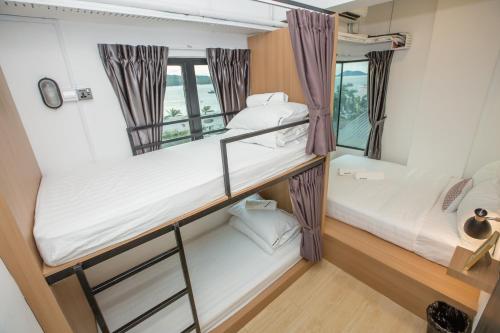 Imagen de la habitación del Homy Seafront Hostel. Foto 11