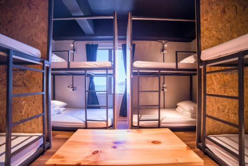 Imagen de la habitación del Homy Seafront Hostel. Foto 18