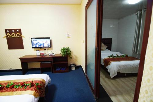 Imagen de la habitación del Hong Fu Business Hotel. Foto 7