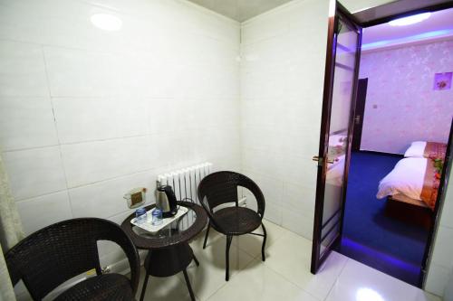 Imagen de la habitación del Hong Fu Business Hotel. Foto 8