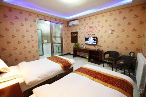 Imagen de la habitación del Hong Fu Business Hotel. Foto 10