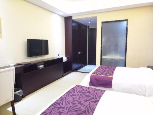 Imagen de la habitación del Hong Run Business Hotel. Foto 6