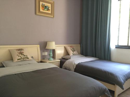 Imagen de la habitación del Hongjia Homestay. Foto 6