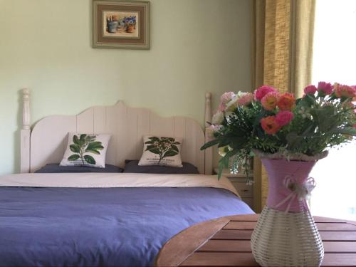 Imagen de la habitación del Hongjia Homestay. Foto 8