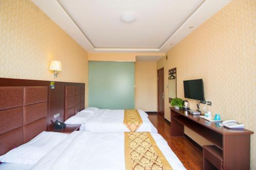 Imagen de la habitación del Hongrui Inn. Foto 8