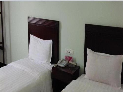 Imagen de la habitación del Hongxiang Inn. Foto 1