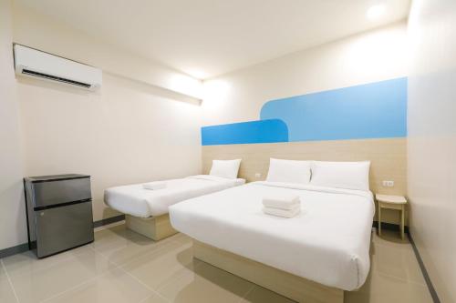 Imagen de la habitación del Hop Inn Hotel Davao. Foto 20