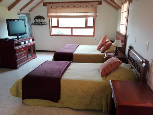 Imagen de la habitación del Hospederia El Portal De Las Flores, Chia. Foto 2