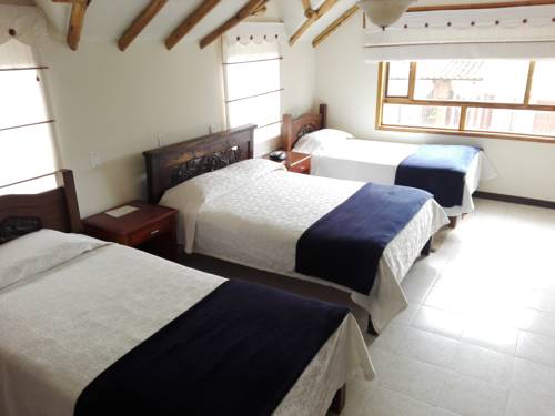 Imagen de la habitación del Hospederia El Portal De Las Flores, Chia. Foto 4