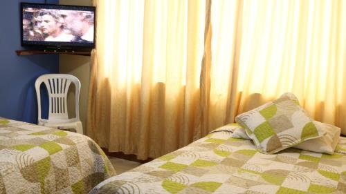 Imagen de la habitación del Hostal Casa Montoya. Foto 17