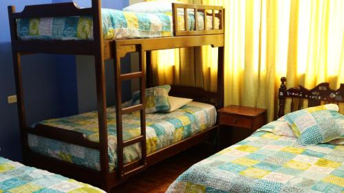 Imagen de la habitación del Hostal Casa Montoya. Foto 19