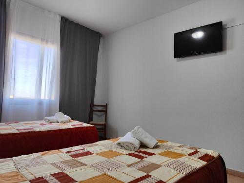 Imagen de la habitación del Hostal Restaurante Venta del Barro. Foto 19