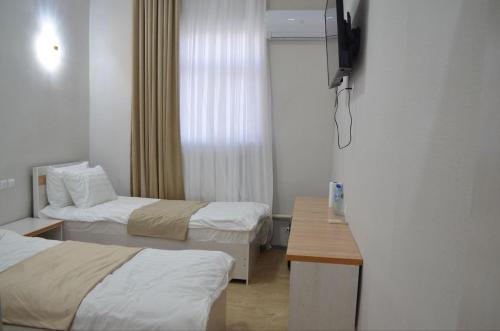 Imagen de la habitación del Hostel DANEXAN APA. Foto 15