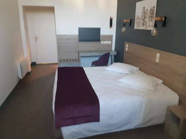 Imagen de la habitación del Hostellerie Charles de Foucauld. Foto 10