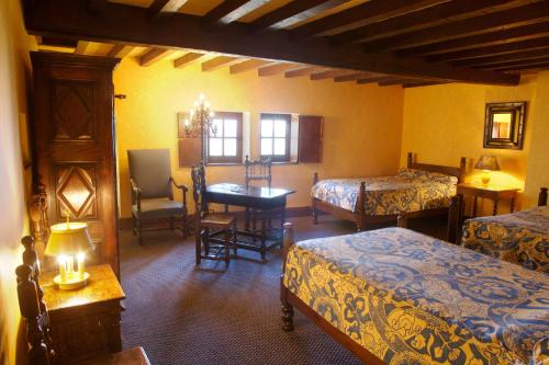 Imagen de la habitación del Hostellerie De Pérouges. Foto 7
