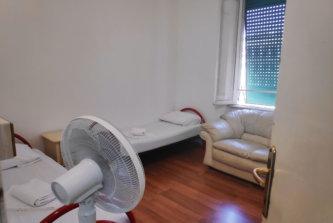 Imagen de la habitación del Hostelroma. Foto 6