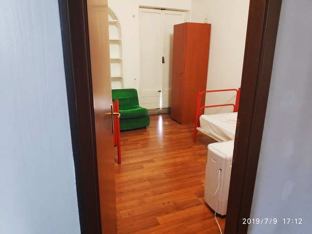 Imagen de la habitación del Hostelroma. Foto 11