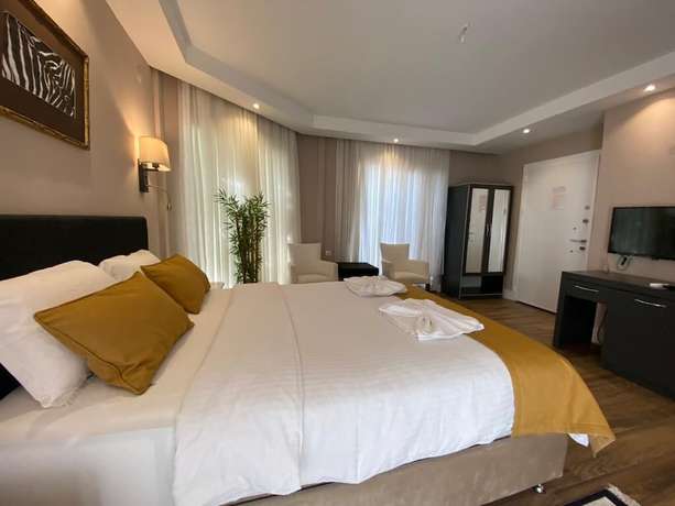 Imagen de la habitación del Hotel 212 Olympos. Foto 3