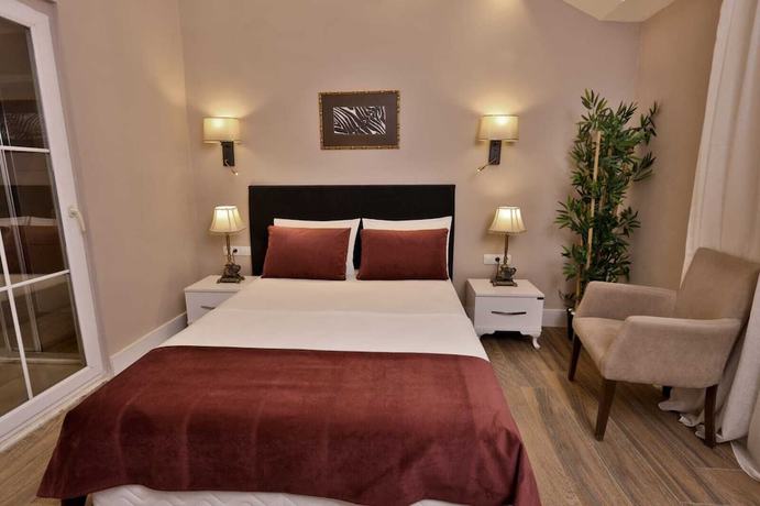 Imagen de la habitación del Hotel 212 Olympos. Foto 12