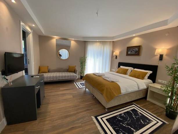 Imagen de la habitación del Hotel 212 Olympos. Foto 16