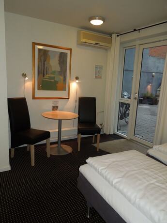 Imagen de la habitación del Hotel Aarhus City Apartments. Foto 22